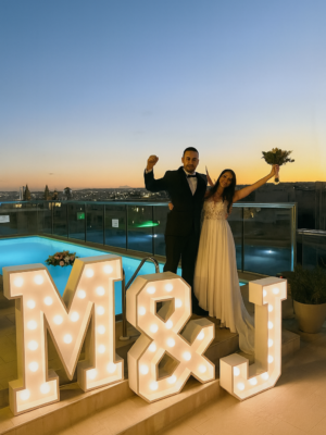 Modern RGB marquee letters at wedding reception in Malta by Celebright Rentals